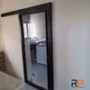 Porta de correr atrás da parede